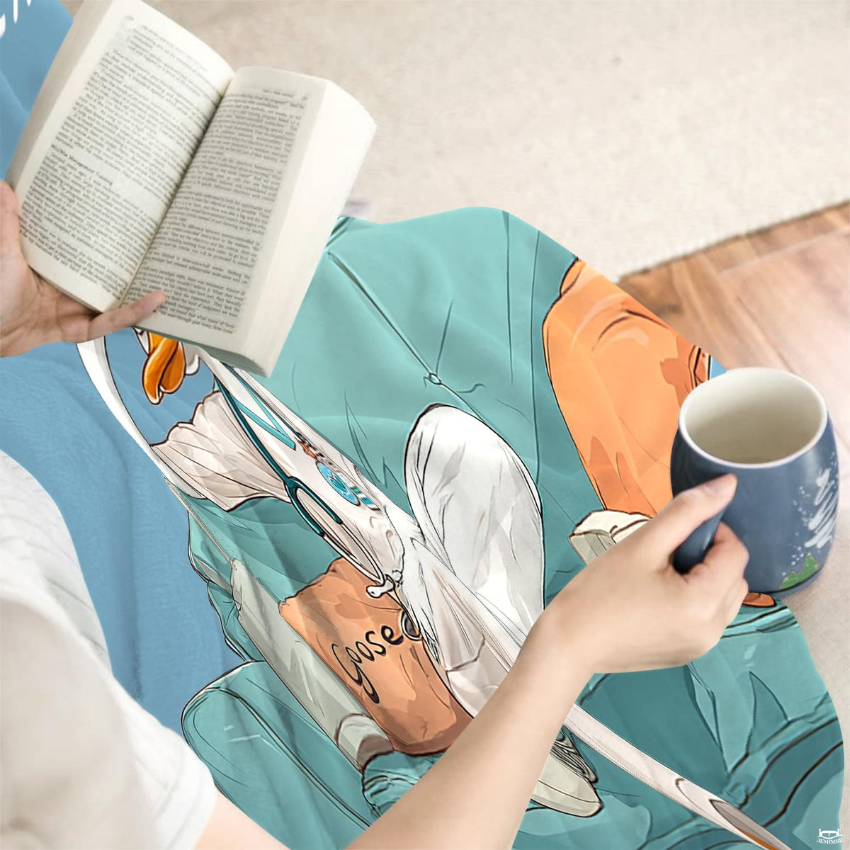 Close up of resting nurse duck throw blanket highlighting duck illustration and stethoscope details