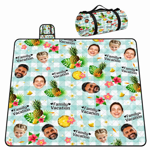 Tropical pattern of pineapples, pink hibiscus, and palm leaves on mint gingham, view 1.