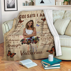 Detail perspective highlighting vintage typography and vivid butterfly illustrations on an affirmation blanket