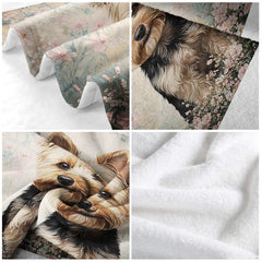 Detailed view of Yorkshire Terrier puppy art framed by pastel garden blossoms on pet lovers bedding.