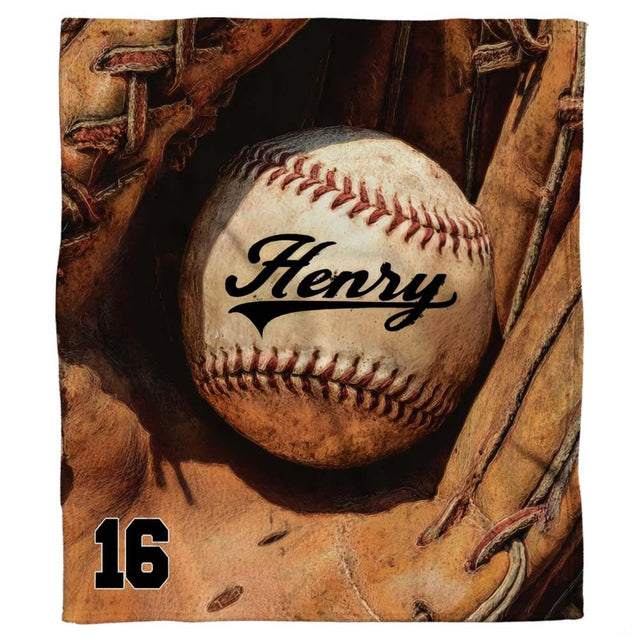 Baseball resting inside a vintage fielder glove with athletic typography, view 1.