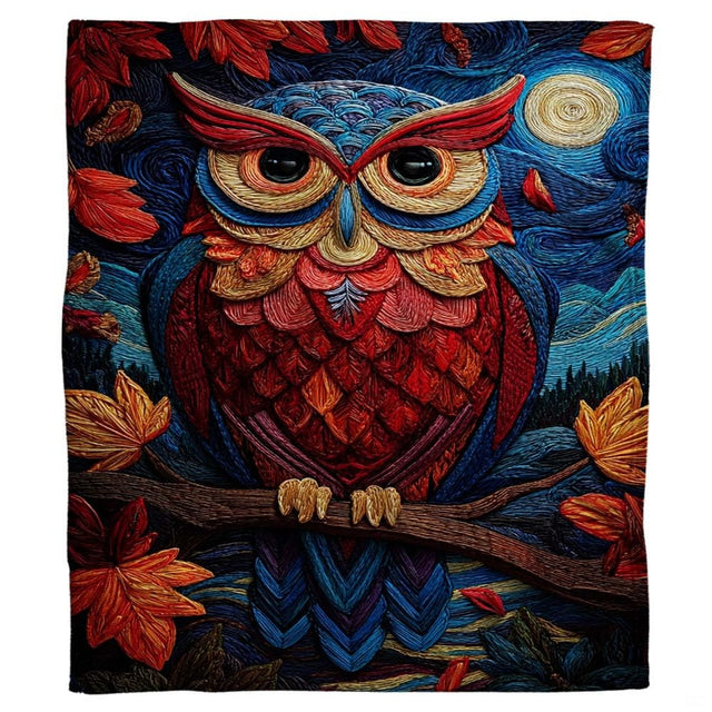 Detailed view of textured red and yellow owl plumage with maple leaves on a blanket