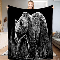 High-contrast monochrome woodcut engraving of grizzly bear walking through tall grass on black background, view 1.