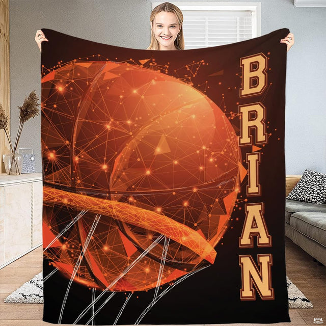 Fiery orange and black athletic bedding set featuring low-poly basketball artwork and varsity lettering.