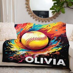 Watercolor sports graphic showing energetic movement as a softball player throws ball at batter in competition.