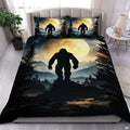 Midnight moon bigfoot silhouette bedding set showing a legendary sasquatch framed by a glowing golden lunar halo.