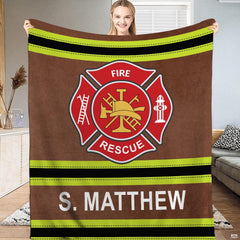 Firefighter turnout gear throw blanket with red Maltese cross emblem and neon lime reflective stripes