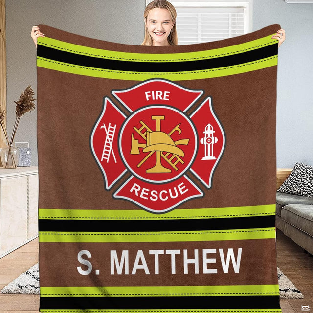 Firefighter turnout gear throw blanket with red Maltese cross emblem and neon lime reflective stripes