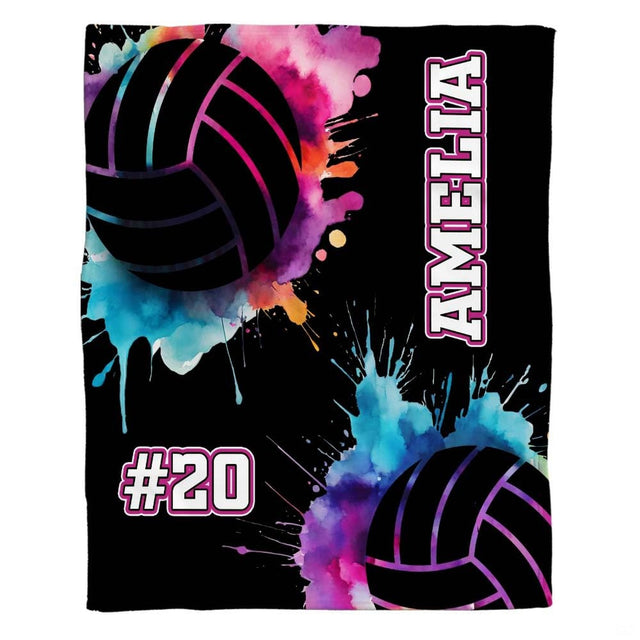 Watercolor splatter volleyball sports throw blanket with neon pink and cyan splashes on black