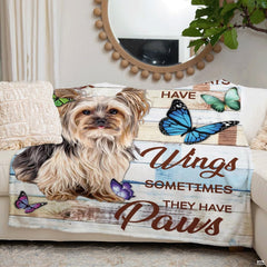Folded presentation of the rustic puppy throw blanket resting neatly on an armchair.