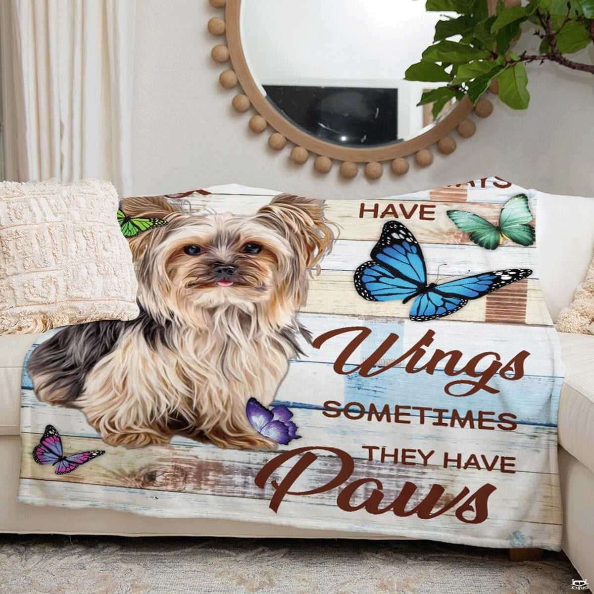 Folded presentation of the rustic puppy throw blanket resting neatly on an armchair.