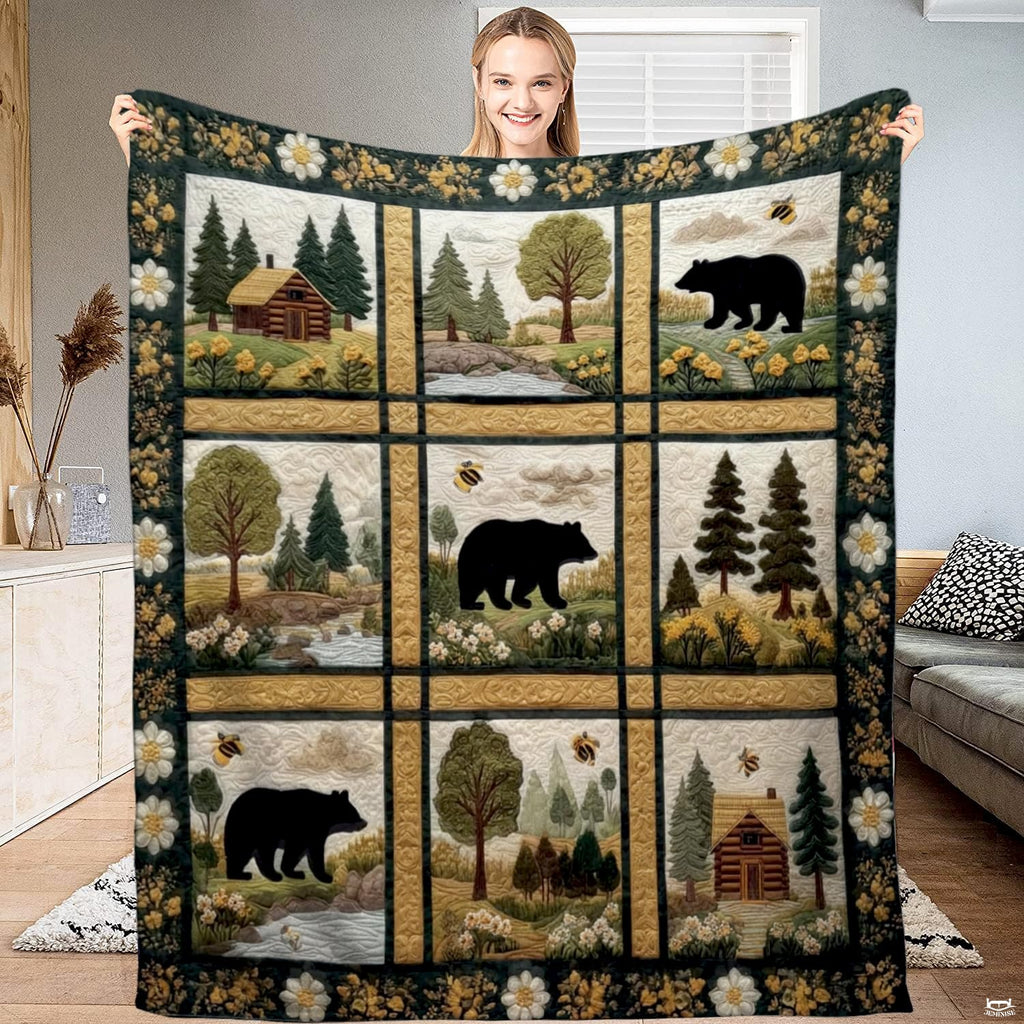 Rustic black bear cabin meadow throw blanket held open by woman