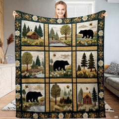 Rustic black bear cabin meadow throw blanket held open by woman