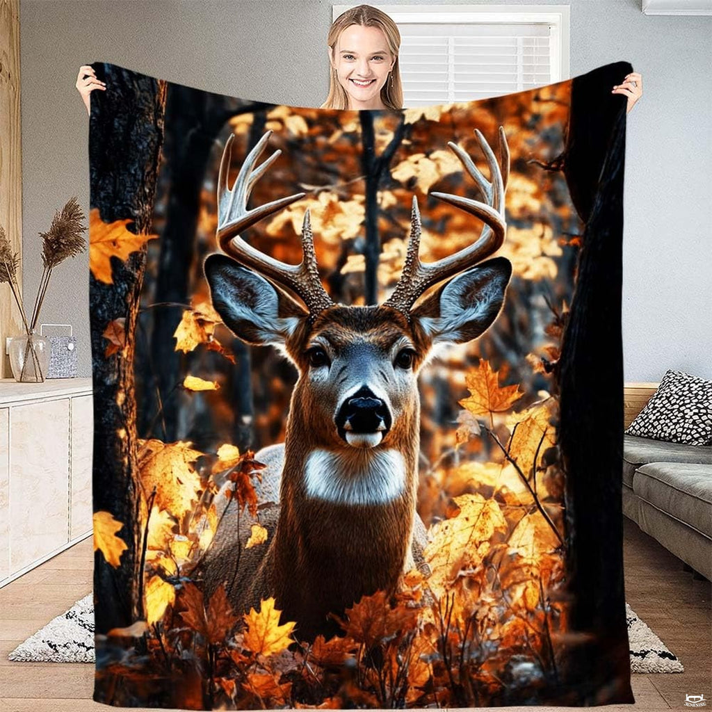 Whitetail buck deer nestled among golden autumn leaves in a rustic wildlife bedding set design.