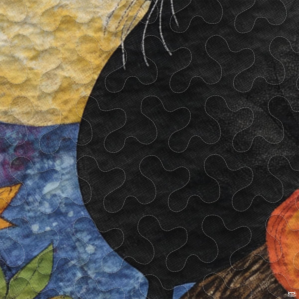 Close-up perspective of autumn bedding showing detailed cat face whiskers and vibrant jewel-toned plaid blocks