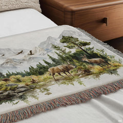Outdoor patio lounge displaying the scenic mountain wildlife couple throw blanket