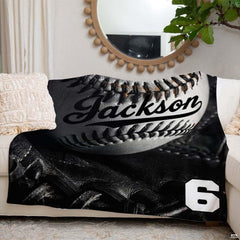 Monochrome studio still-life of a baseball inside a black fielder glove with dramatic lighting, view 6.