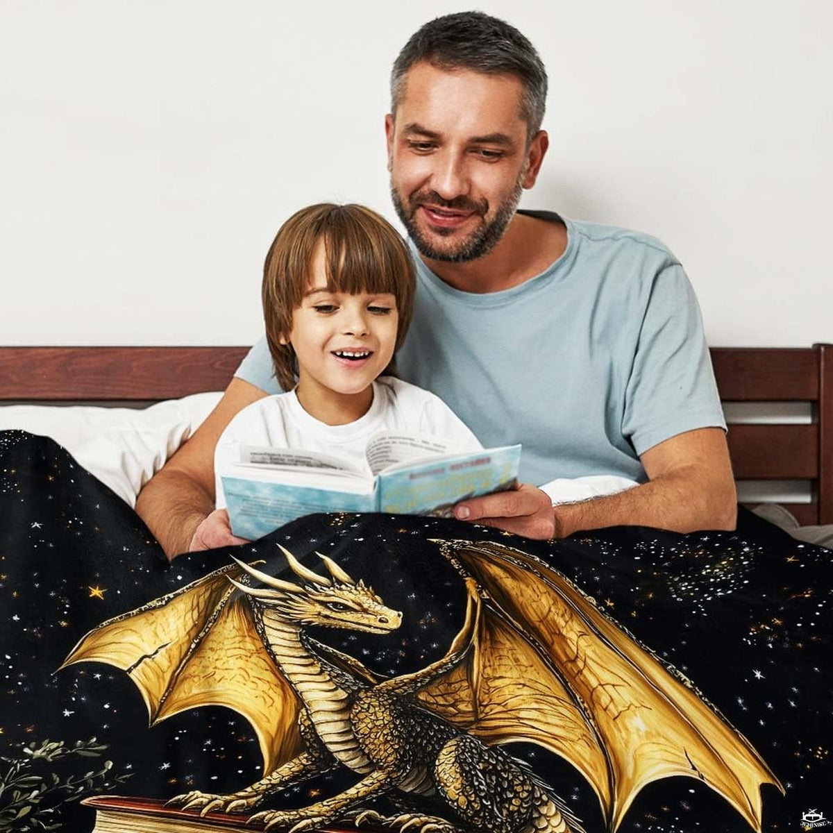 Folded view of the golden dragon blanket showing perimeter border hem and crisp graphic details.