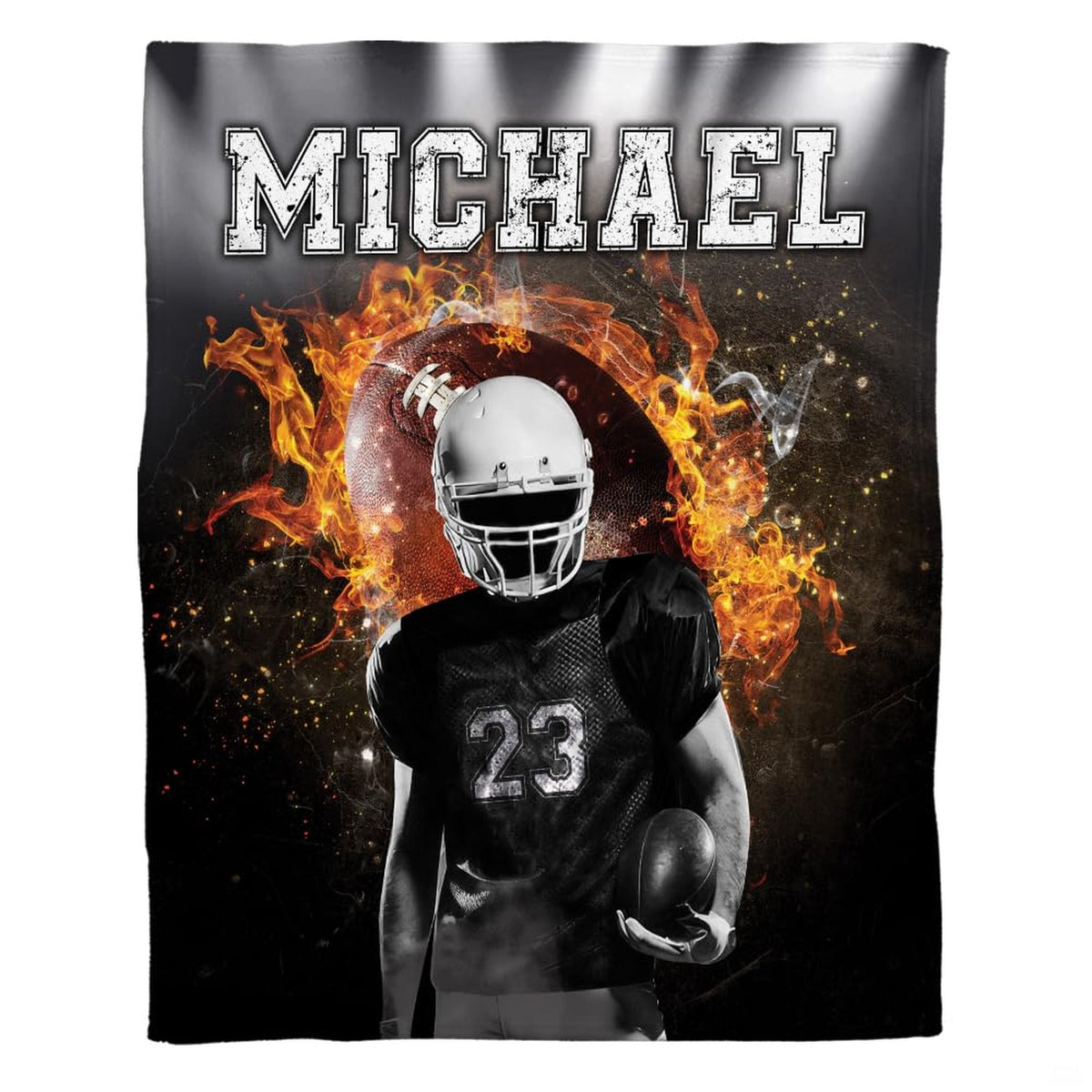 Woman holding open flaming football throw blanket showing fiery flames and distressed typography
