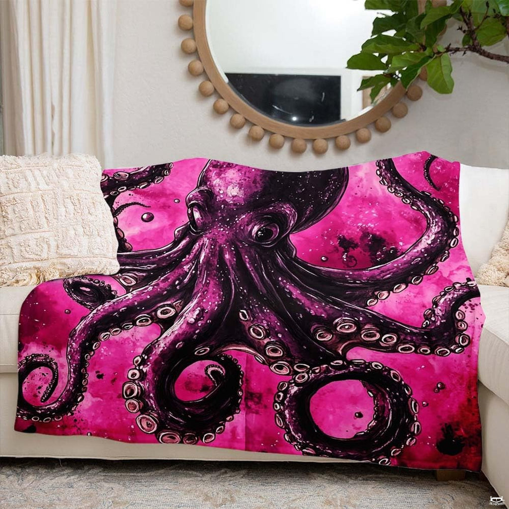 Cosmic magenta octopus design displayed draped across a living room sofa.