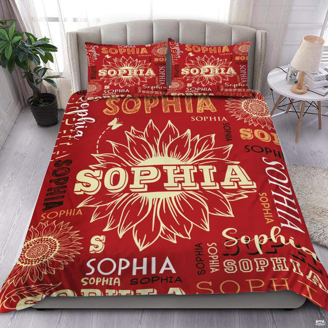 Crimson rose and terracotta unicorn botanical bedding set displayed neatly on a bed in a whimsical bedroom