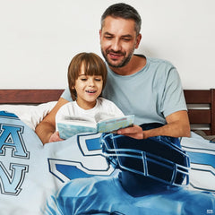 Close-up of athletic jersey typography and football helmet print on bedding set.