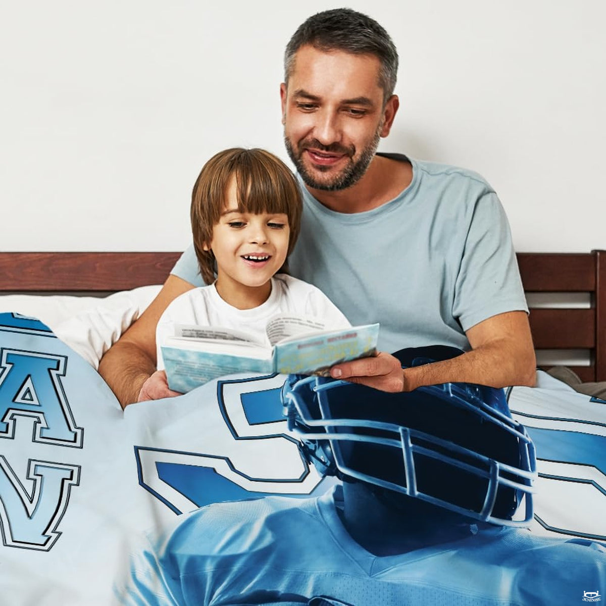 Close-up of athletic jersey typography and football helmet print on bedding set.