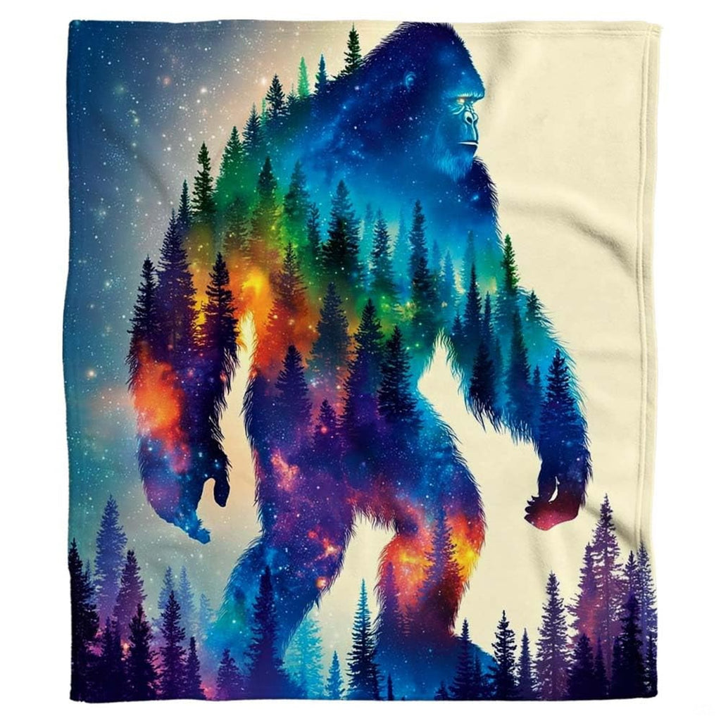 Cosmic Bigfoot throw blanket view 2 highlighting celestial galaxy art and pine forest silhouette detailing