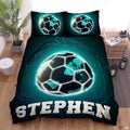Cosmic galaxy soccer sports bedding featuring a soccer ball graphic with glowing teal nebula stardust on a bed