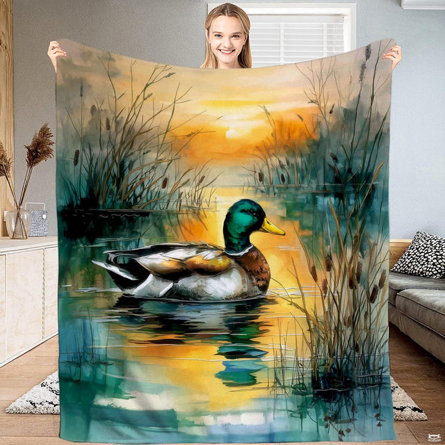 Mallard duck sunset lake watercolor throw blanket displaying a swimming drake amidst cattails and golden water