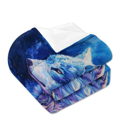 Folded bedding with blue wolf face, cosmic specks, and white reverse