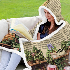 Overhead presentation of library bookshelf and reader girl blanket
