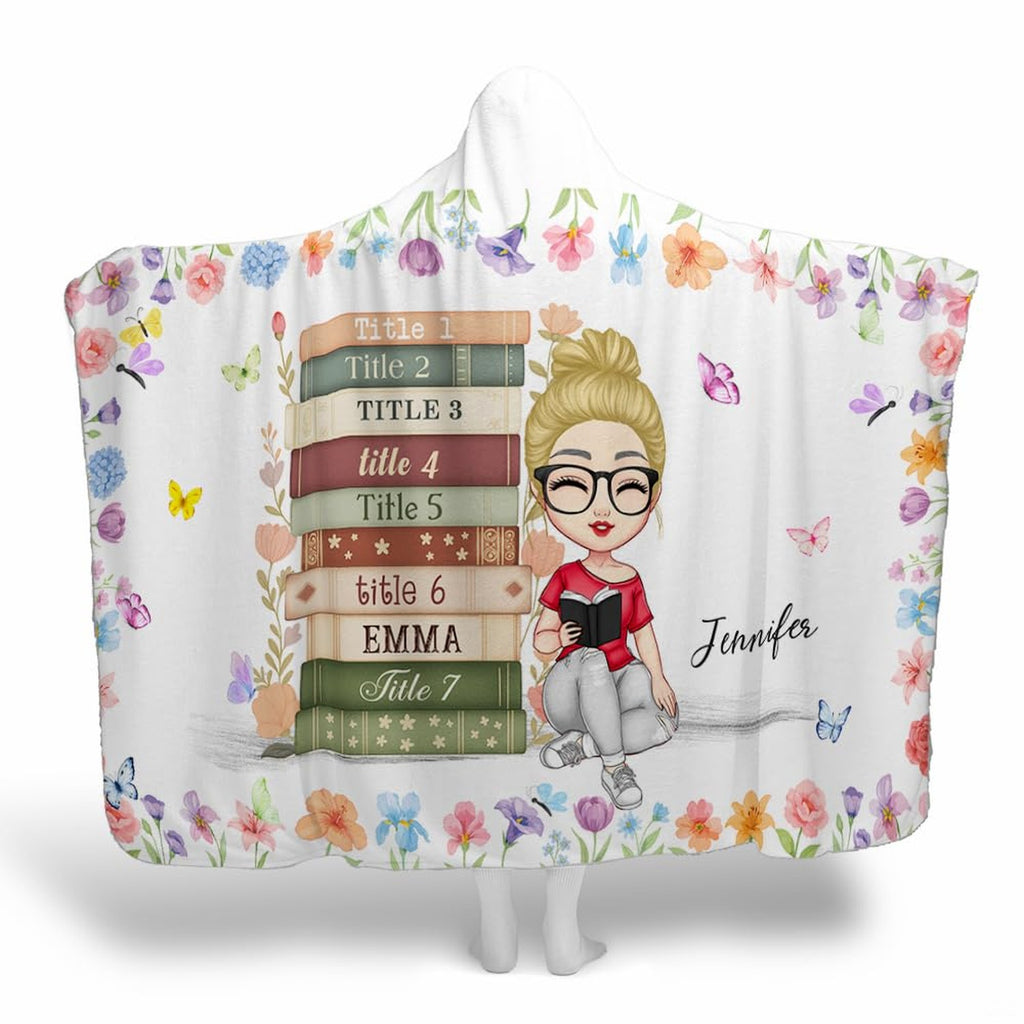 Charm bedding set showing reading girl with butterflies and pastel wildflowers.