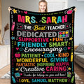 Chalkboard style bedding set with colorful crayon and red apple illustrations.