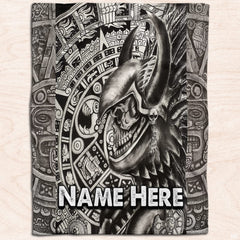 Father and child in bed reading covered by black and white warrior skull throw blanket