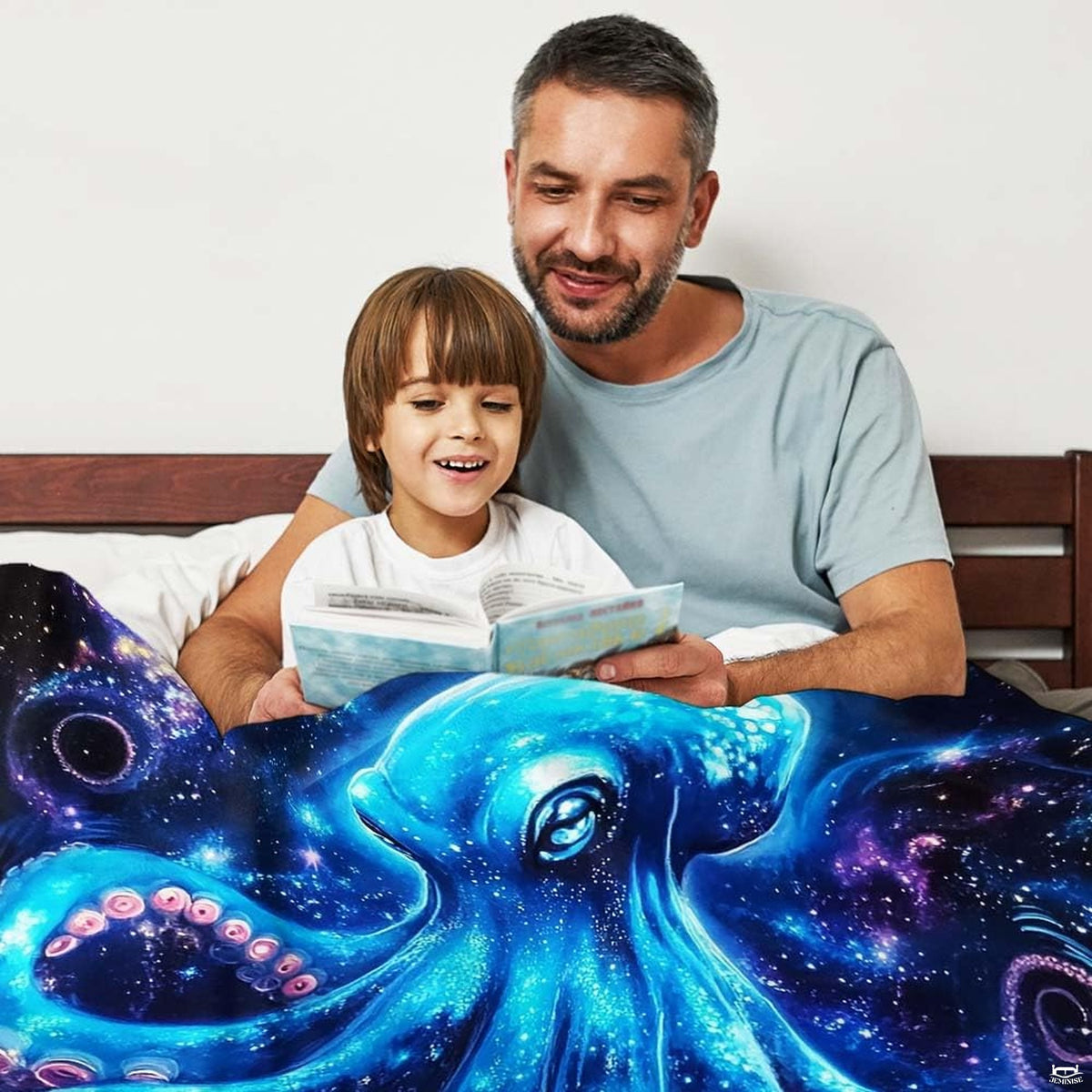 Overhead view of an oceanic octopus bedding set surrounded by vibrant starry skies and deep navy hues.