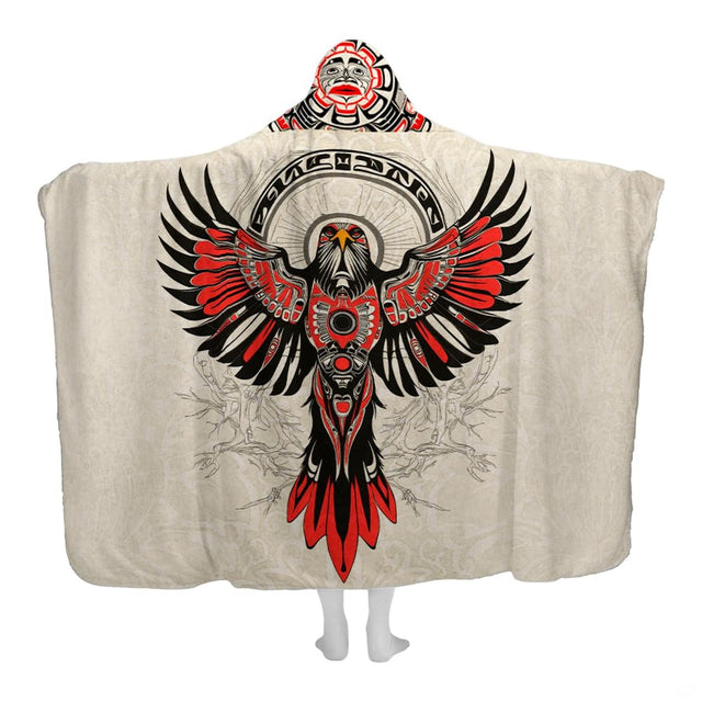 Pacific Northwest eagle hooded blanket featuring red and black formline thunderbird and sunburst halo.