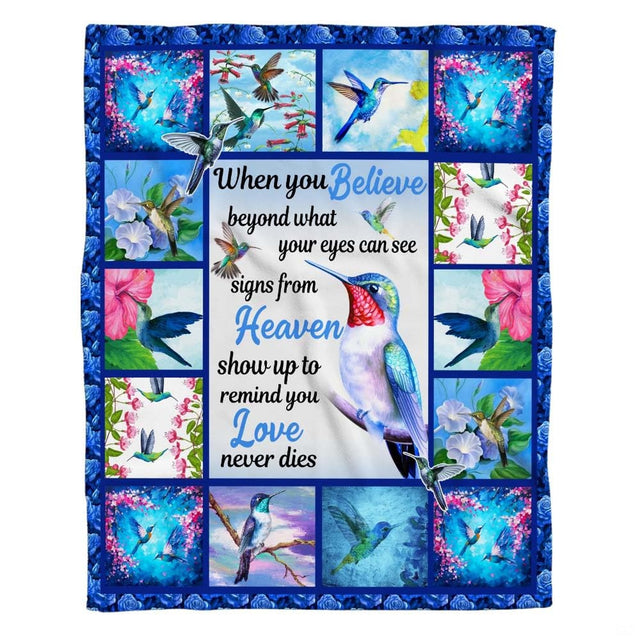 Hummingbird floral collage throw blanket view 2 highlighting iridescent bird artwork and garden room styling
