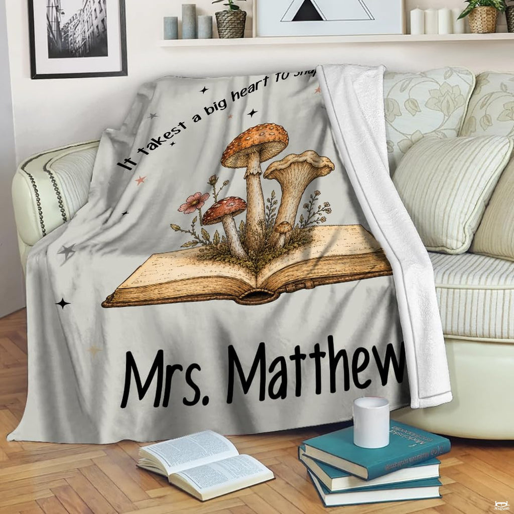 Cottagecore bedroom display featuring vintage botanical bedding with whimsical toadstool illustrations.