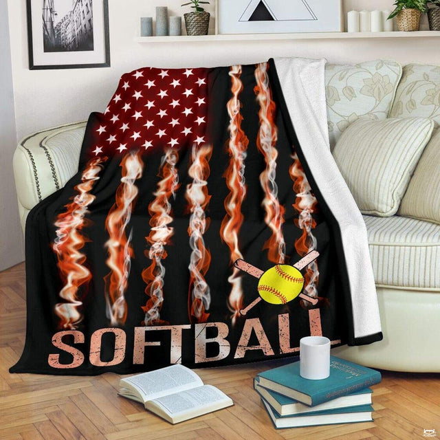 Fiery flag sports graphic with crossed bats draped over living room armchair with open novels.