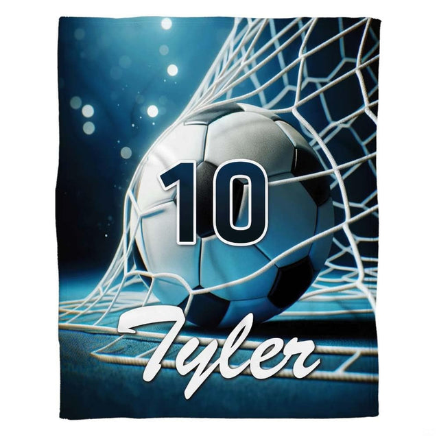 Close up graphic detail of white netting and textured soccer ball against luminous stadium bokeh circles.