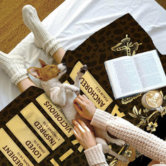 Complete top-thematic accent view of butterfly leopard print bedding highlighting golden vine details and animal print...