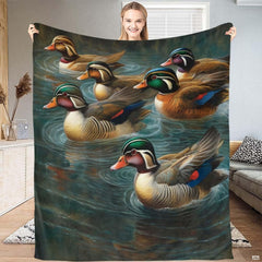Close up of wood duck sheets showcasing iridescent green crests, chestnut chests, and cobalt wing accents.
