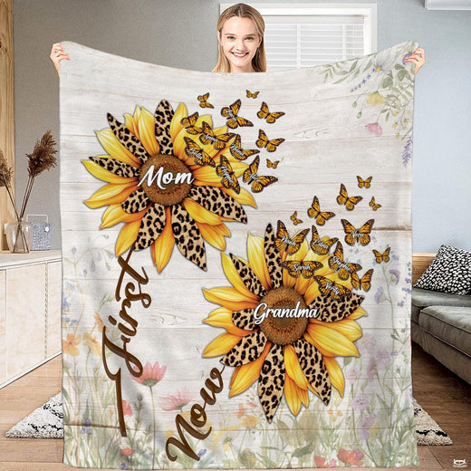 Leopard sunflower First Mom Now Grandma throw blanket held open by woman