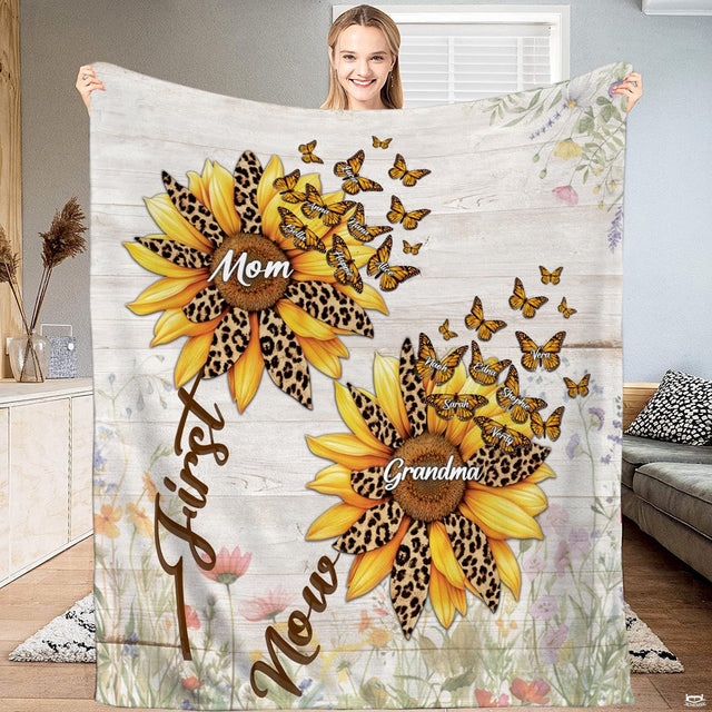 Leopard sunflower First Mom Now Grandma throw blanket held open by woman