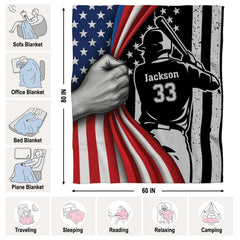 Detailed view of batter illustration and dynamic peeled flag graphics on athletic bedding.