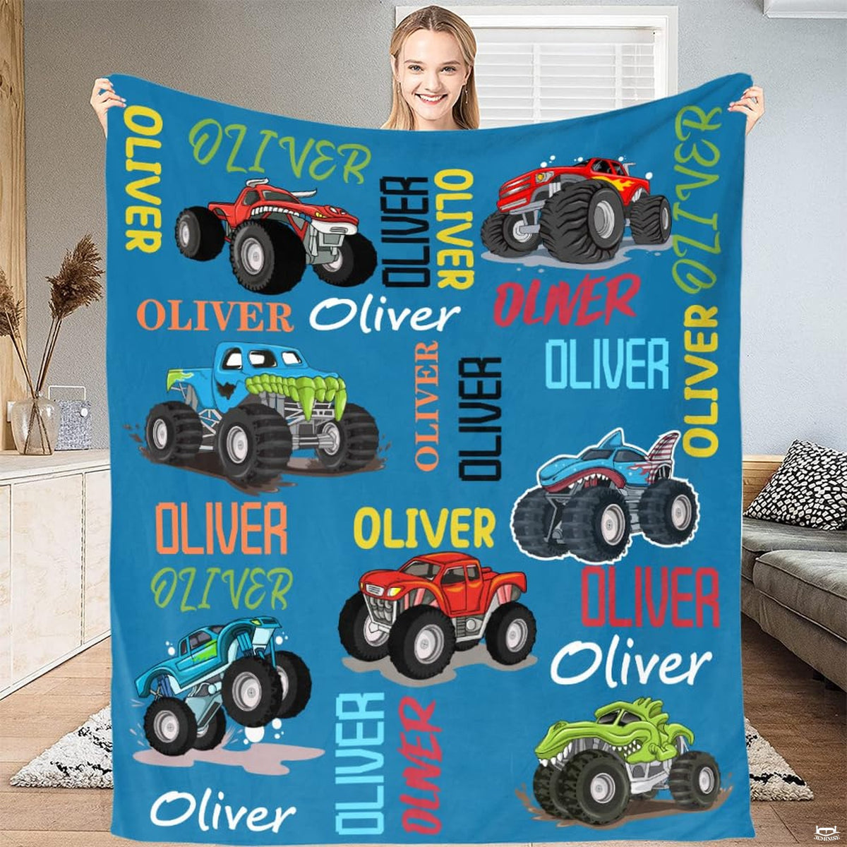 Monster trucks blue cartoon throw blanket displaying shark trucks and giant off-road tires on blue
