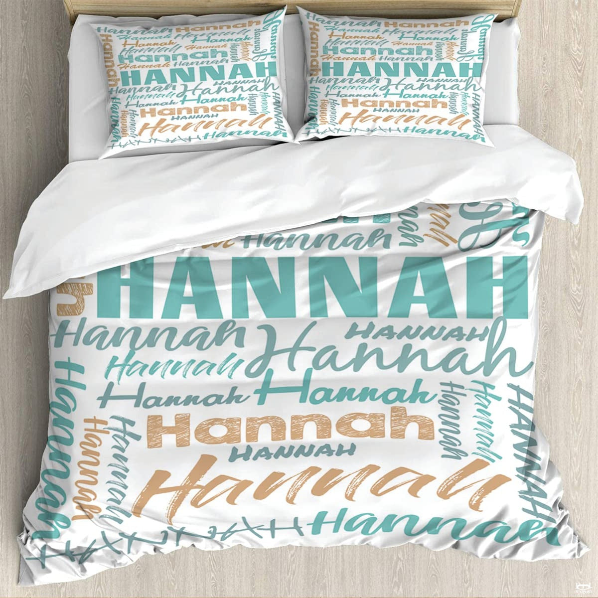 Turquoise typography bedding featuring an interlocking word collage in block and script fonts on white backdrop