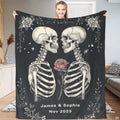 Lifestyle view showing gothic skull lovers design held open.