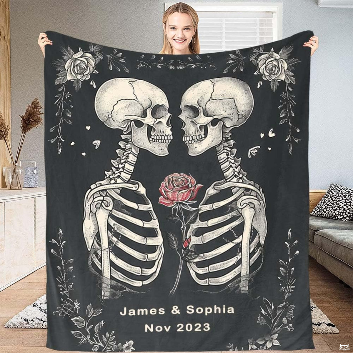 Lifestyle view showing gothic skull lovers design held open.